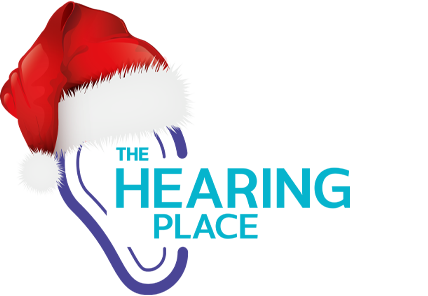 The Hearing Place logo wearing a Santa hat